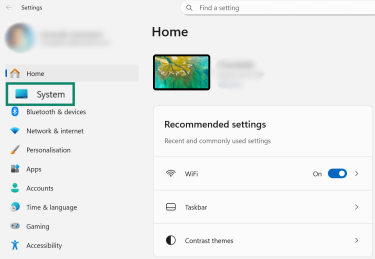 Windows 11 Settings Home with System selected in the left sidebar.